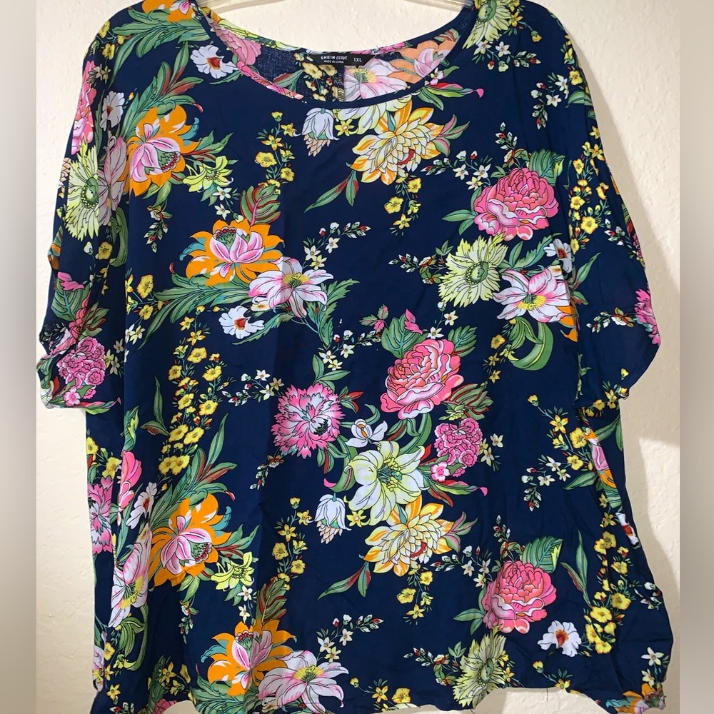 Blue multicolored shirt with flowers